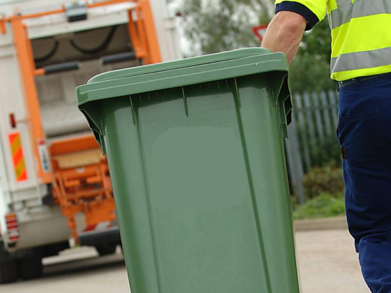 Wheelie bin being collected