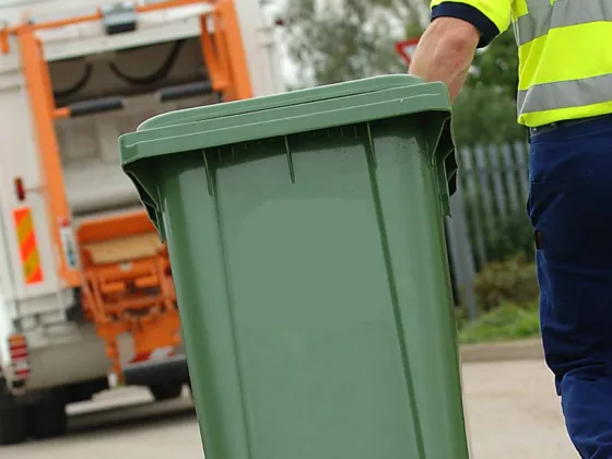 Wheelie bin being collected